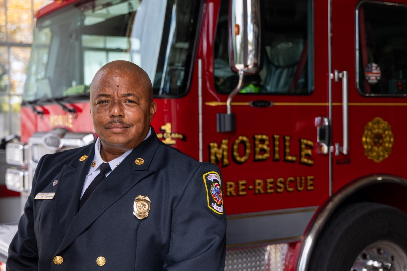 Mobile Fire-Rescue Department Fire Chief Johnny Morris Jr. photogrpahed in front of Engine 3