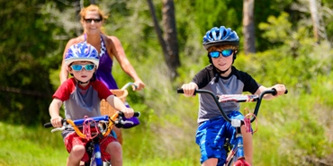 family riding bikes